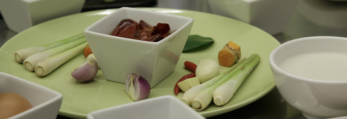 Fresh lemongrass, galangal, shallots and chilli paste used in Khmer cooking classes in Cambodia